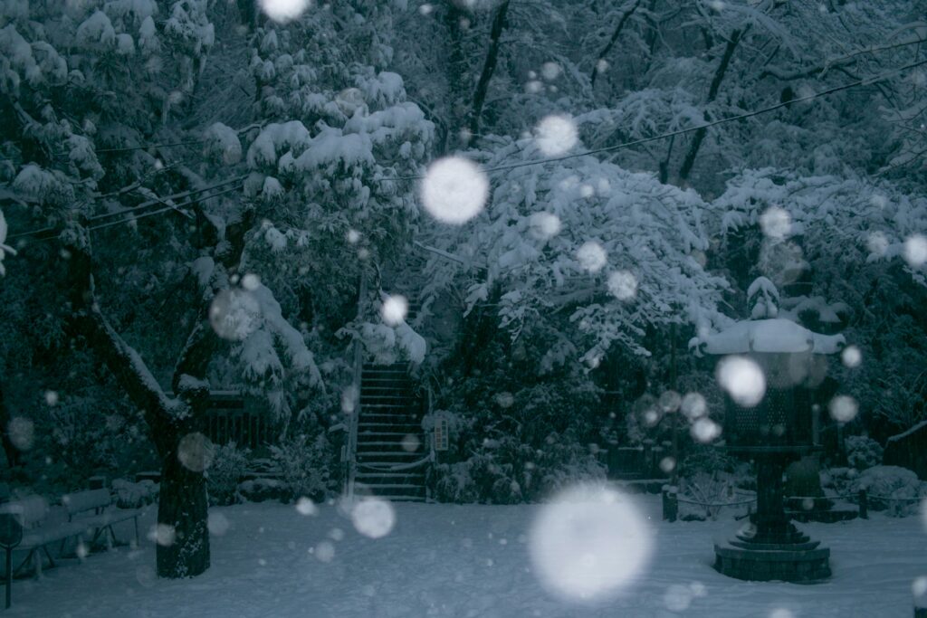 Snow falling in a Japan Temple Garden