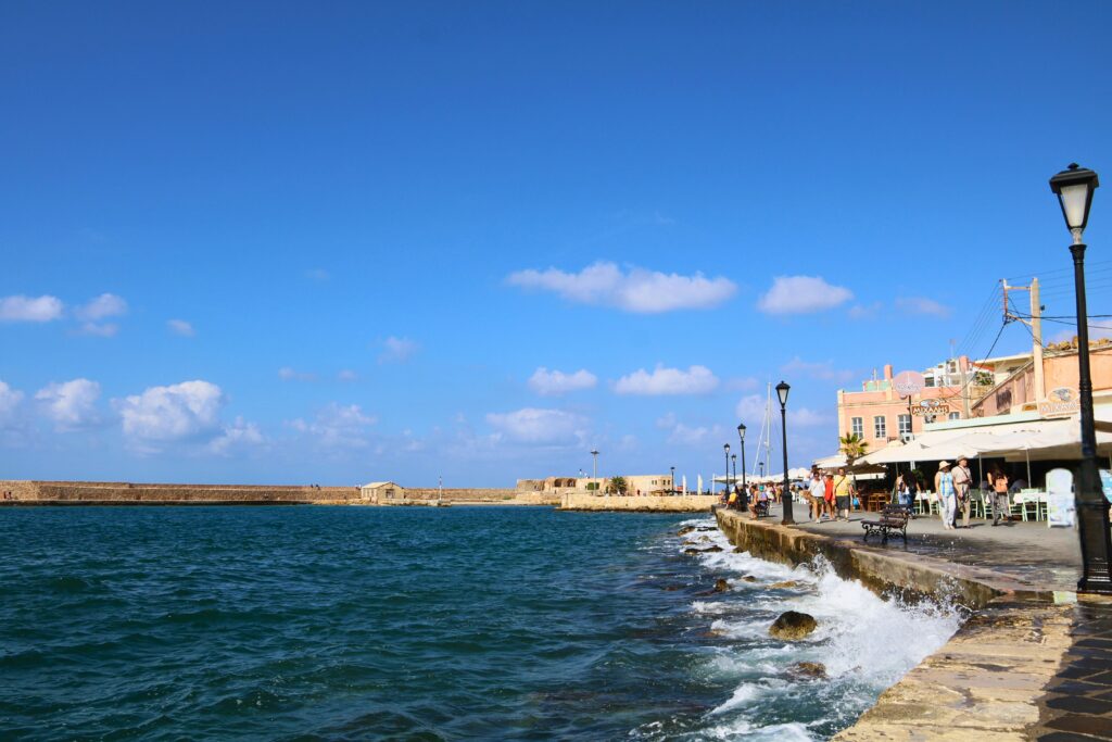 Waterfront promenade in Chania’s Old Venetian Harbor on Crete.