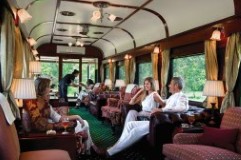 Passengers relaxing in the Rovos Rail observation car, southern Africa